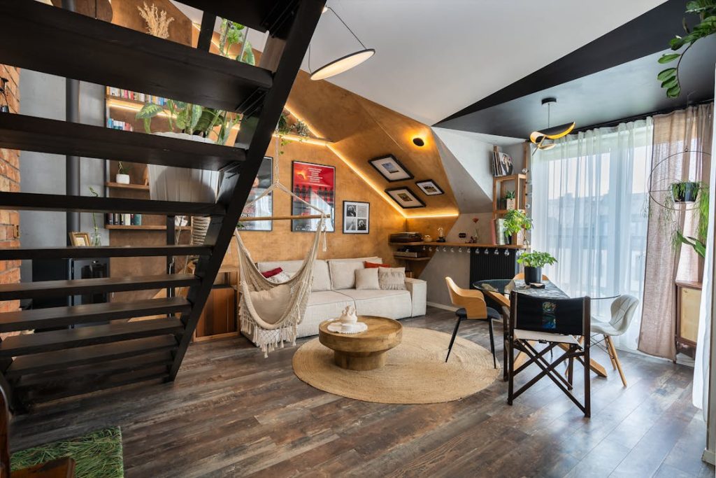 Photo by Mateusz Pielech from Pexels: https://www.pexels.com/photo/modern-cozy-loft-living-room-with-hammock-and-loft-staircase-29252605/